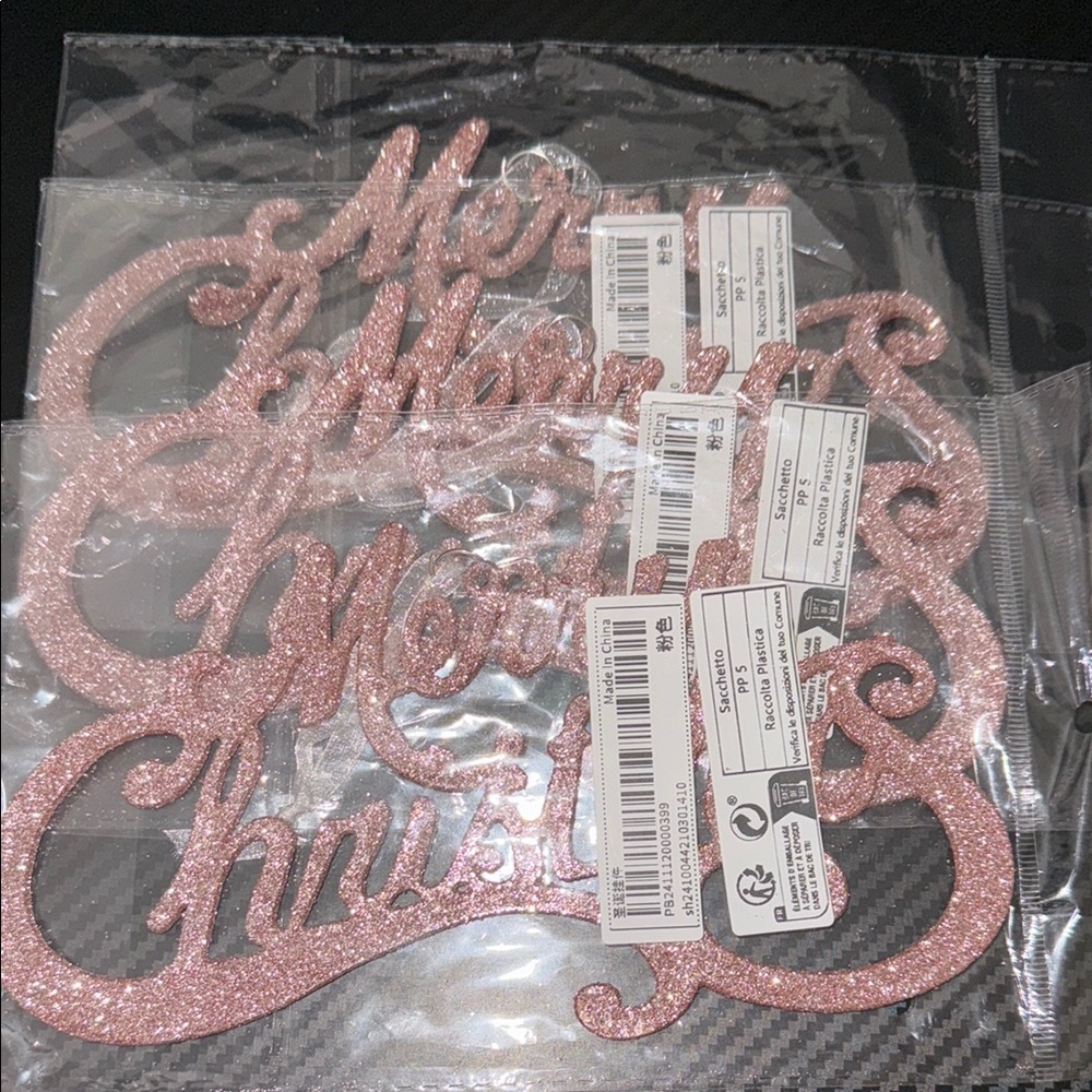 Three new light pink Christmas ornaments.